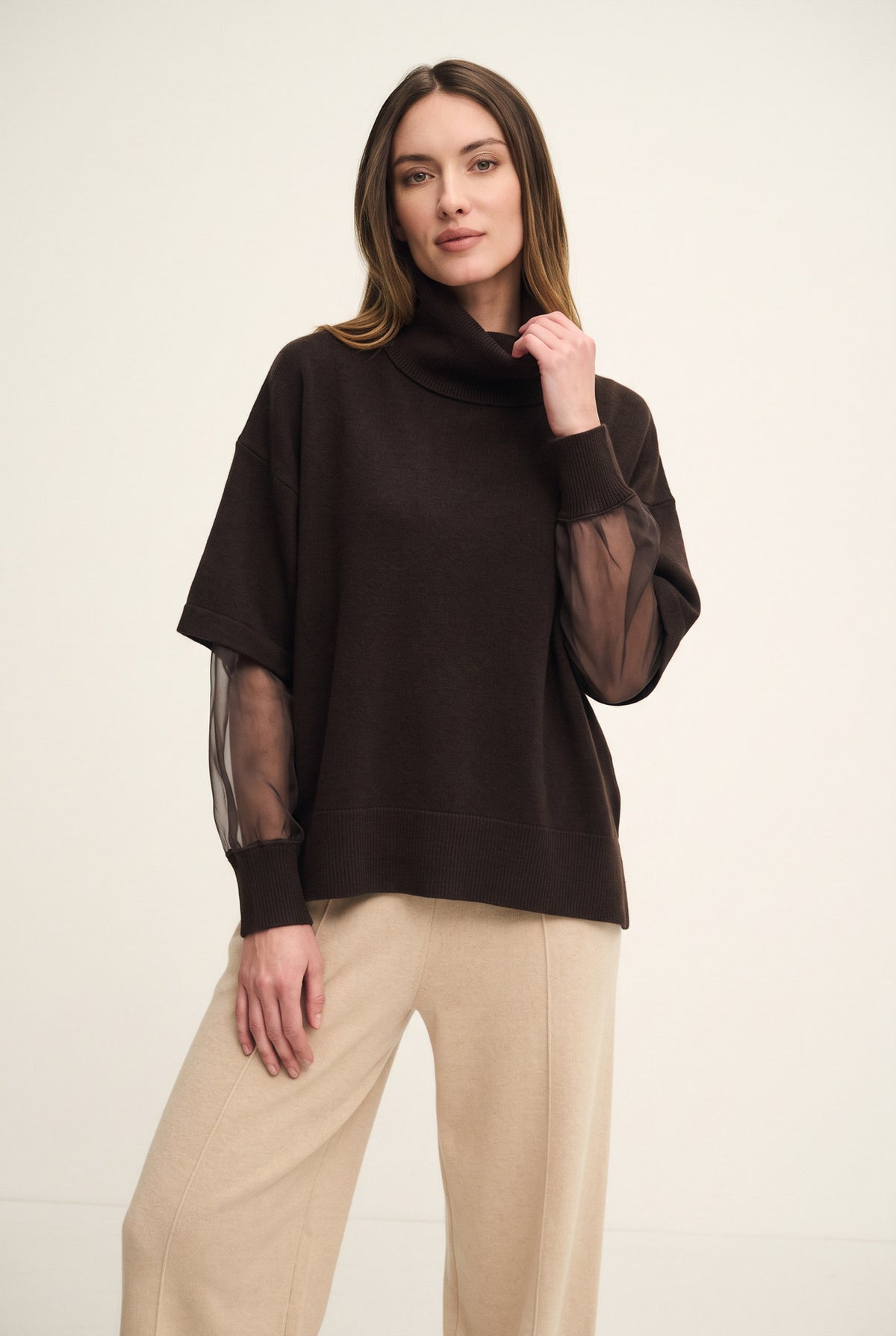 Top with organza sleeves