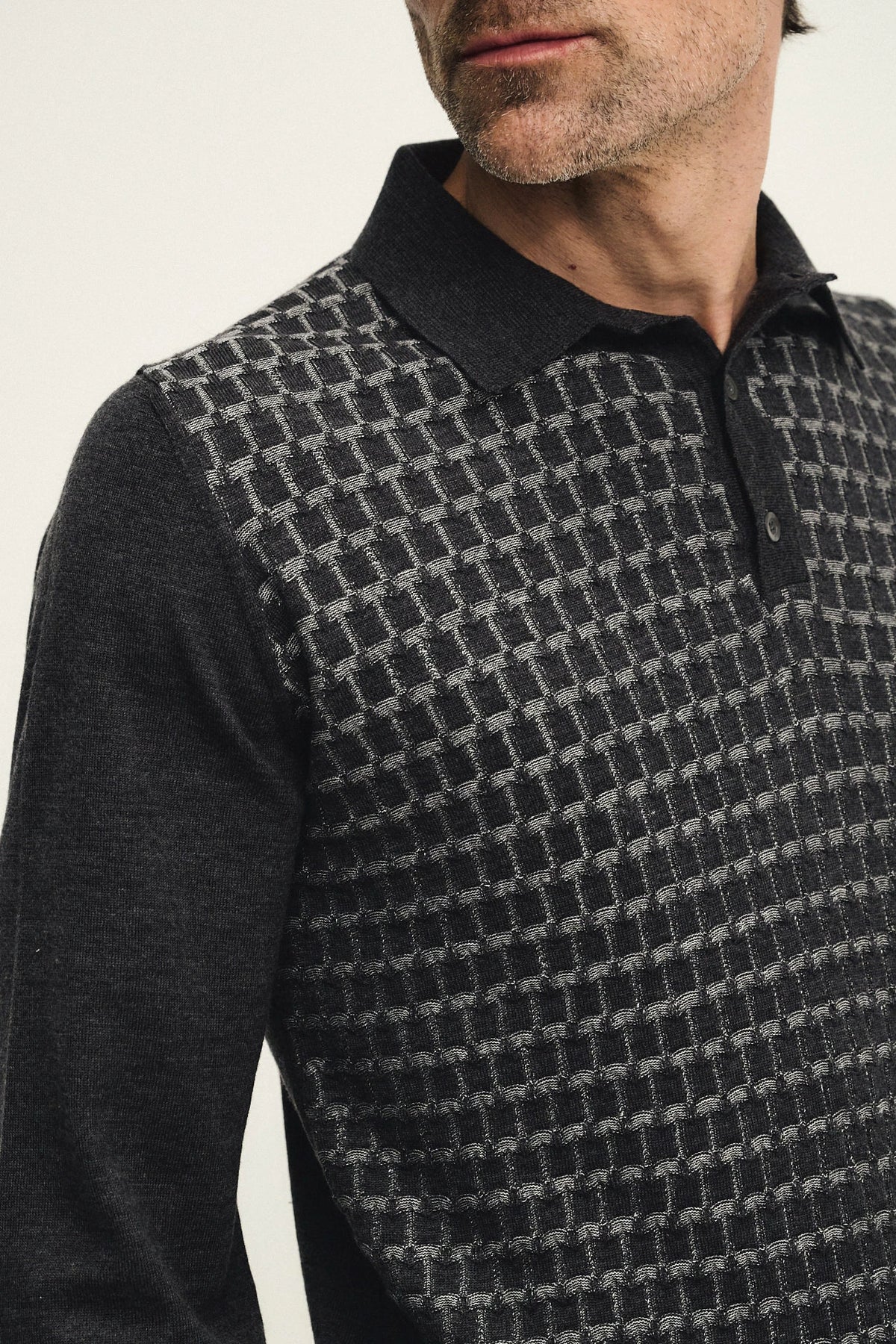 Polo in maglia con punto vanisé geometrico