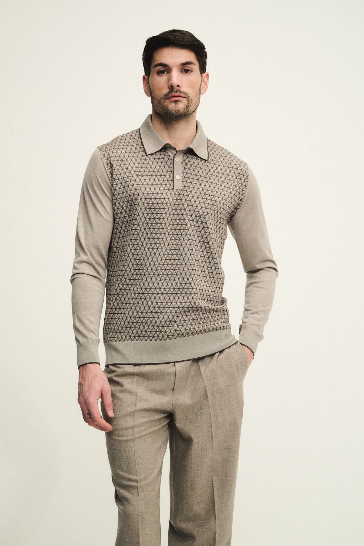 Polo bottoni con fantasia jacquard geometrica