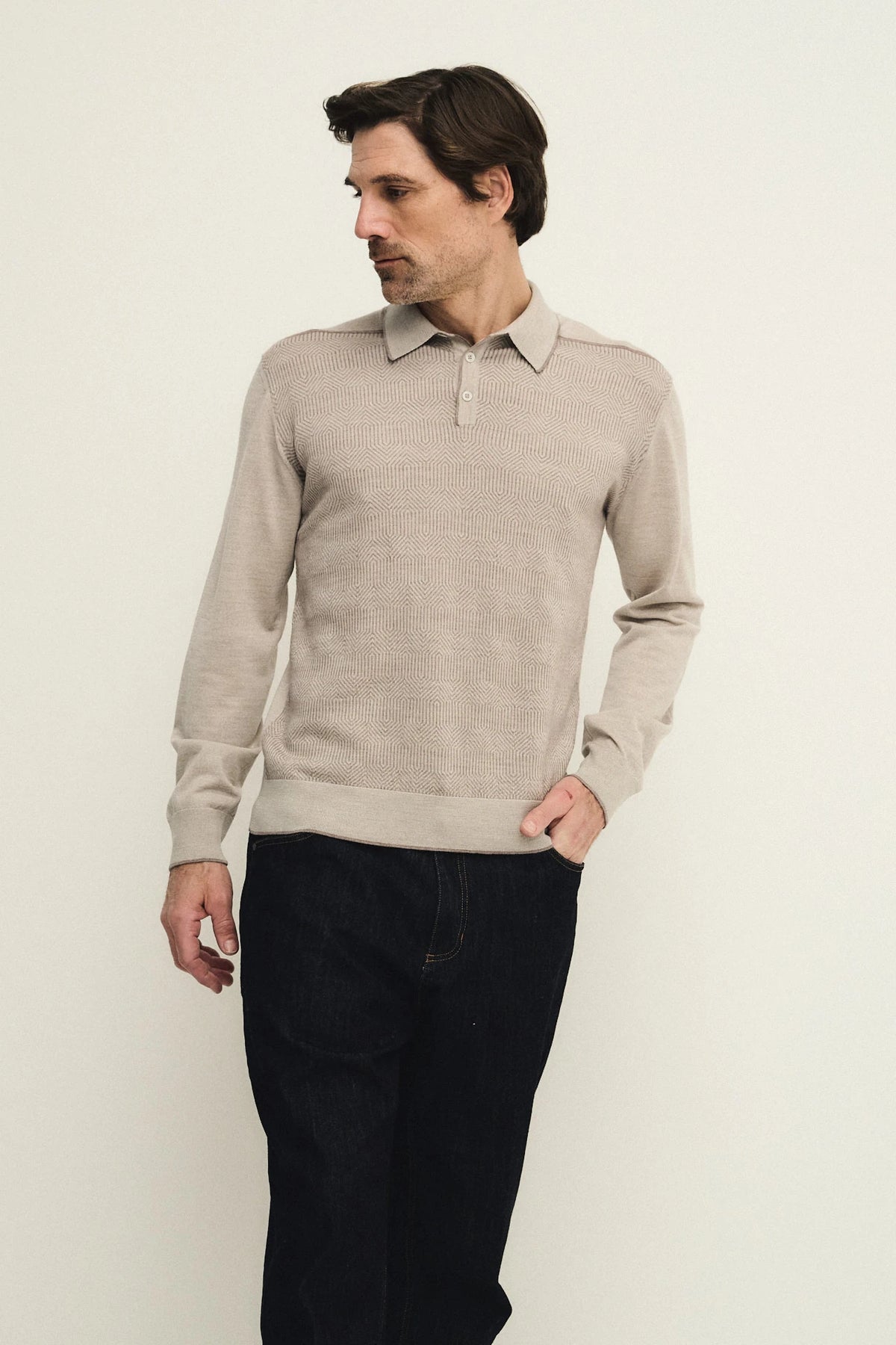 Polo bottoni con fantasia geometrica