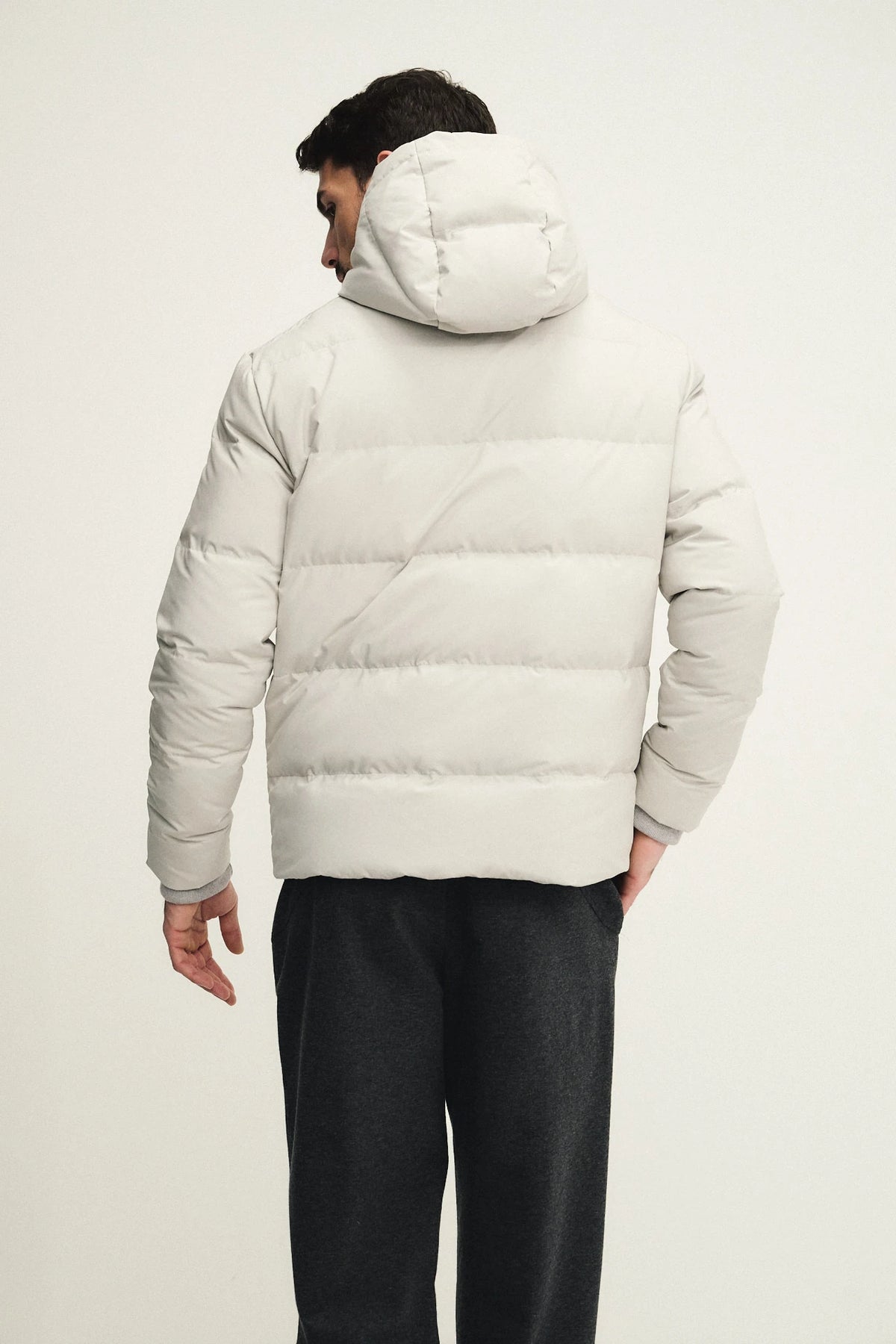 Technical fabric down jacket with wool, silk, and cashmere details