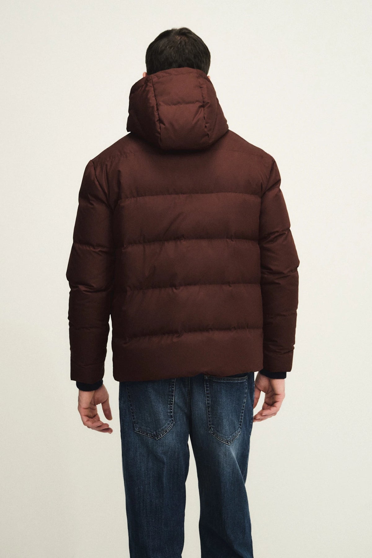 Technical fabric down jacket with wool, silk, and cashmere details