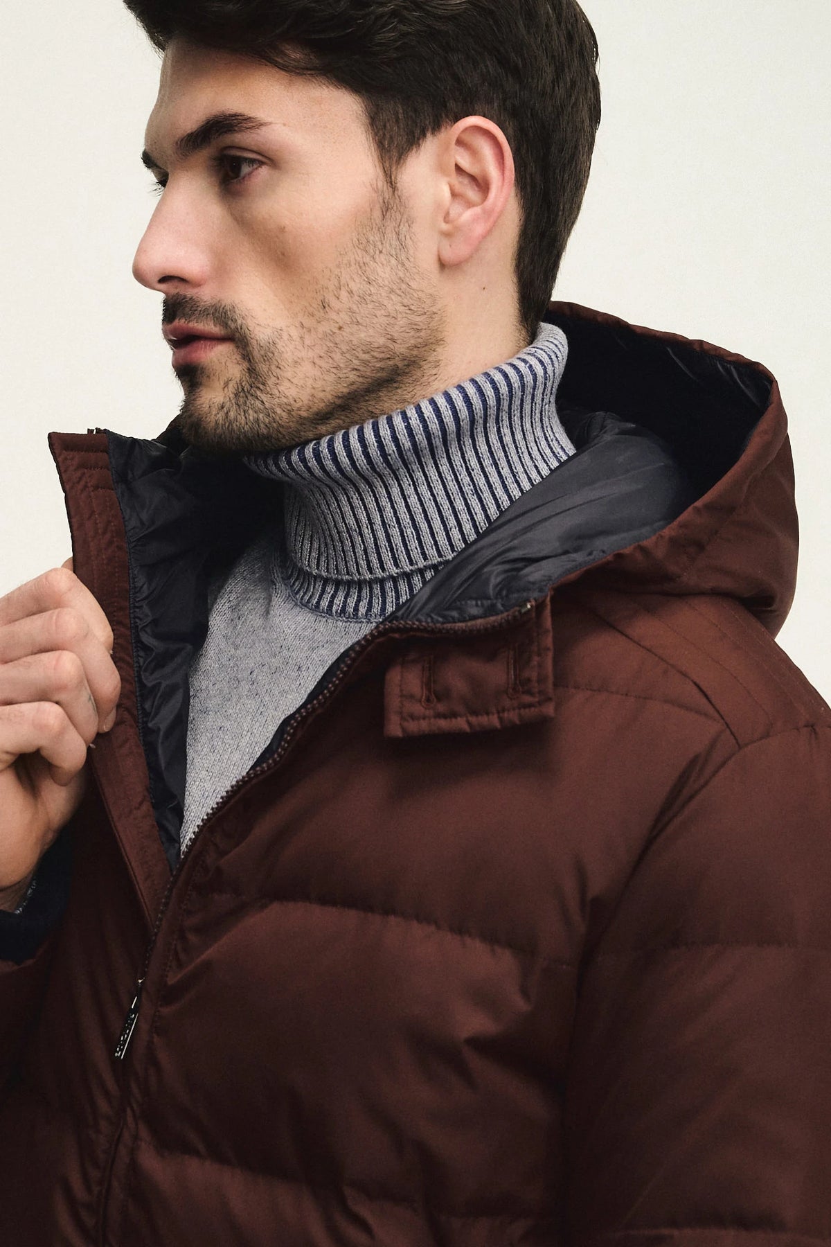 Technical fabric down jacket with wool, silk, and cashmere details