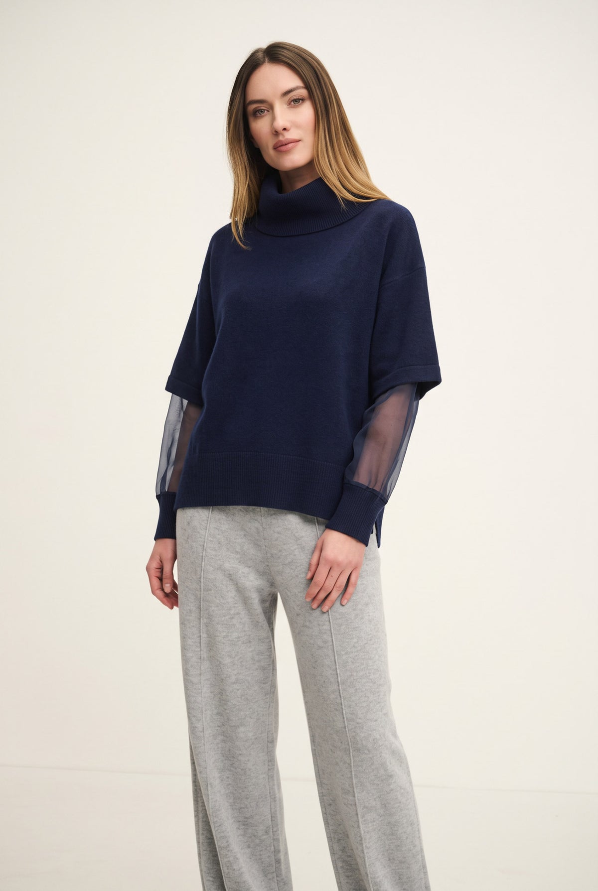 Top with organza sleeves