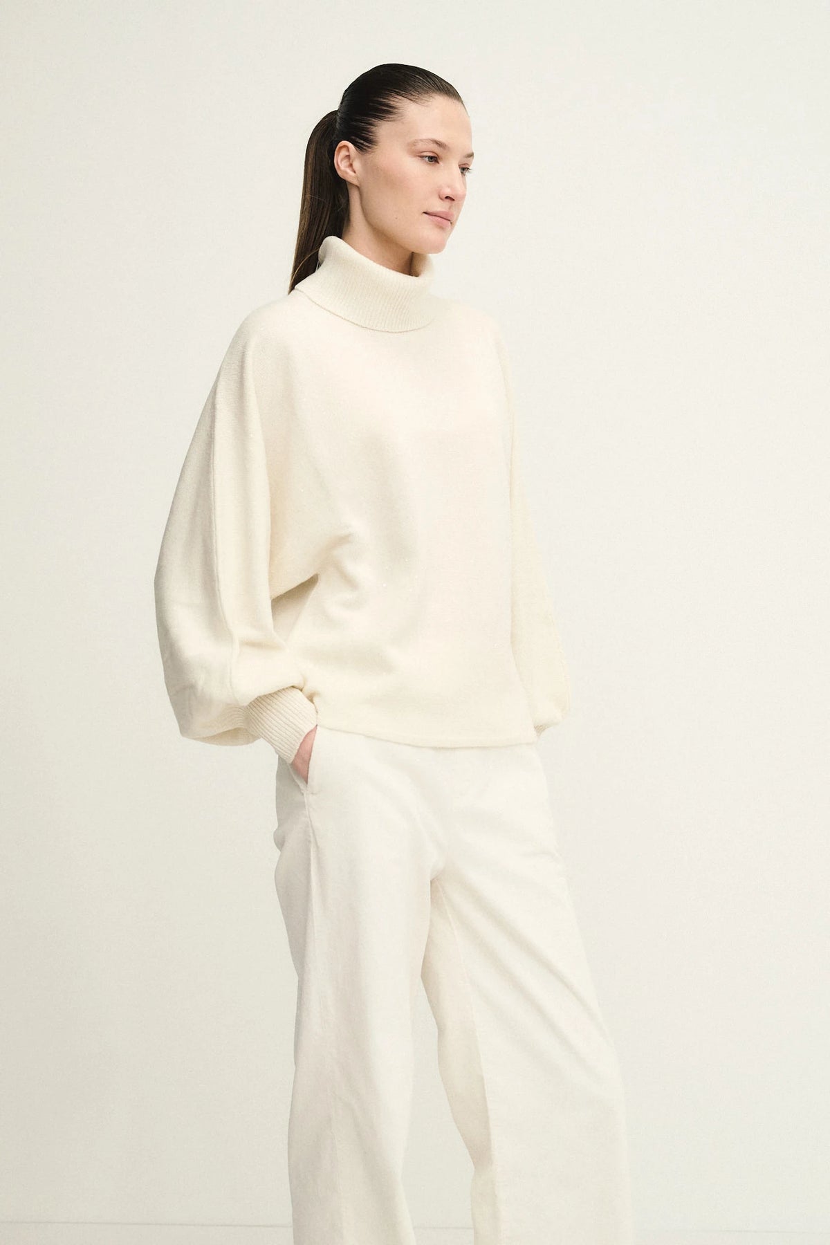 Dazzling top with cowl neck