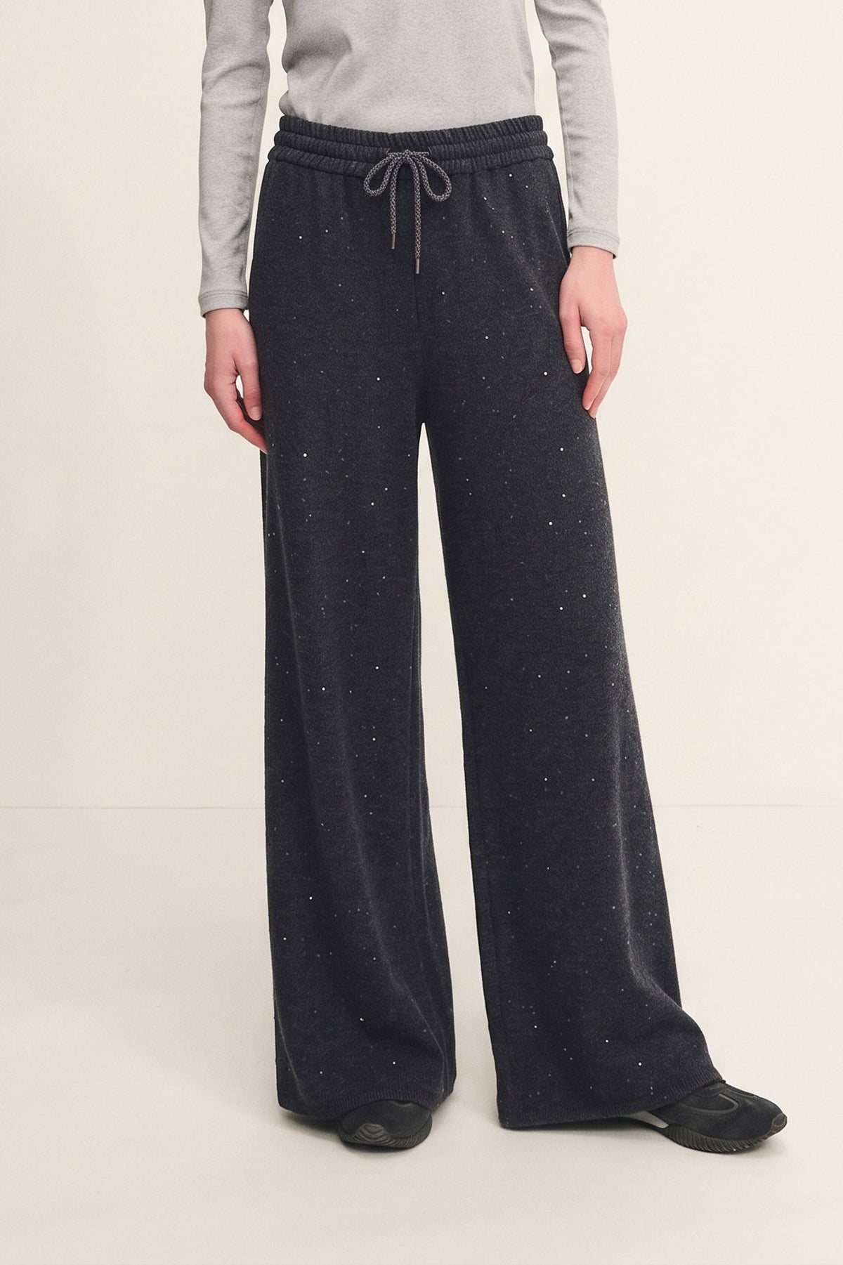 Pantaloni dazzling in maglia con dettagli in denim