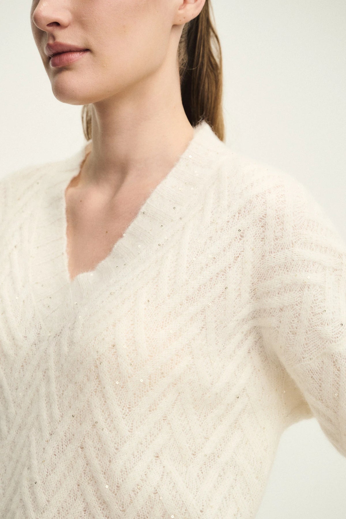 Maglia lumière con scollo a V