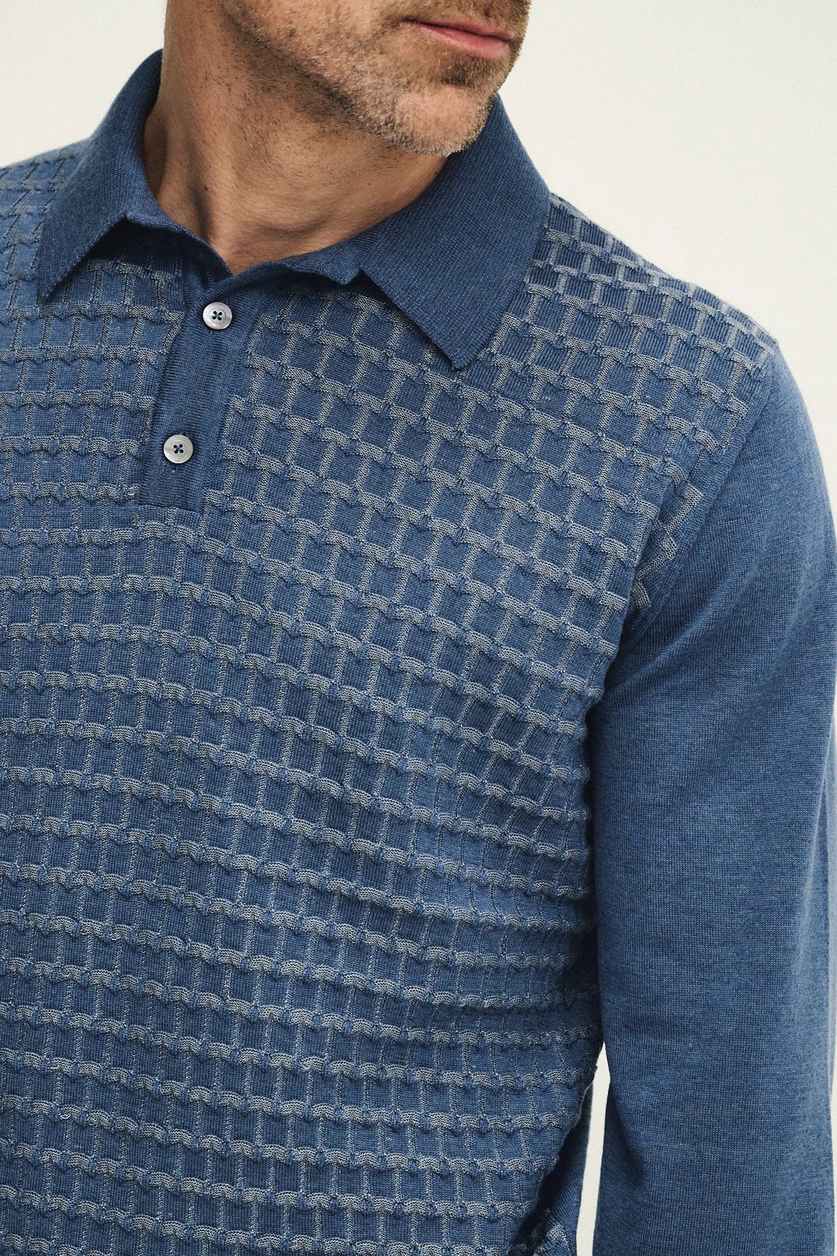 Polo in maglia con punto vanisé geometrico
