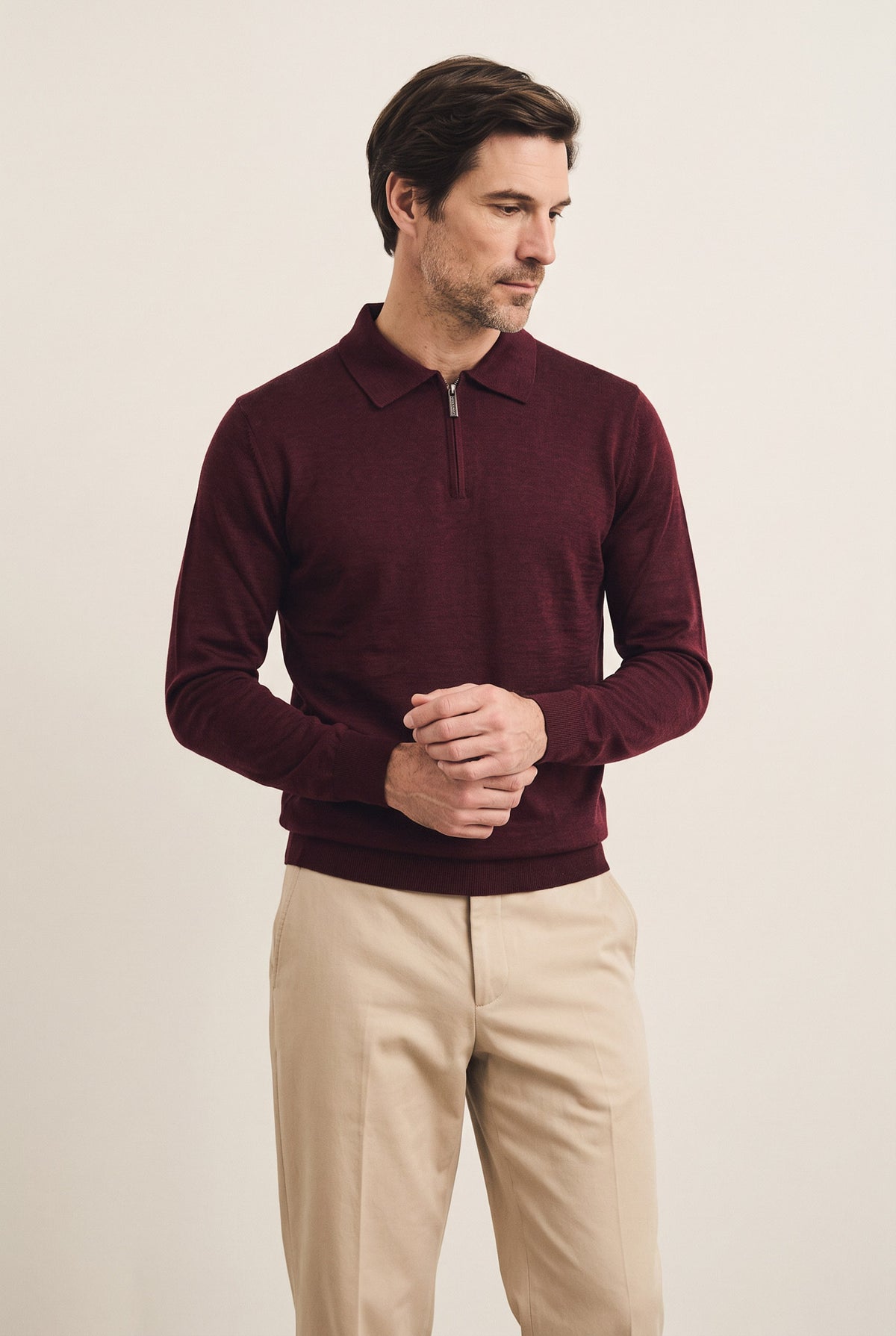 Polo in maglia con zip in pura lana vergine e seta