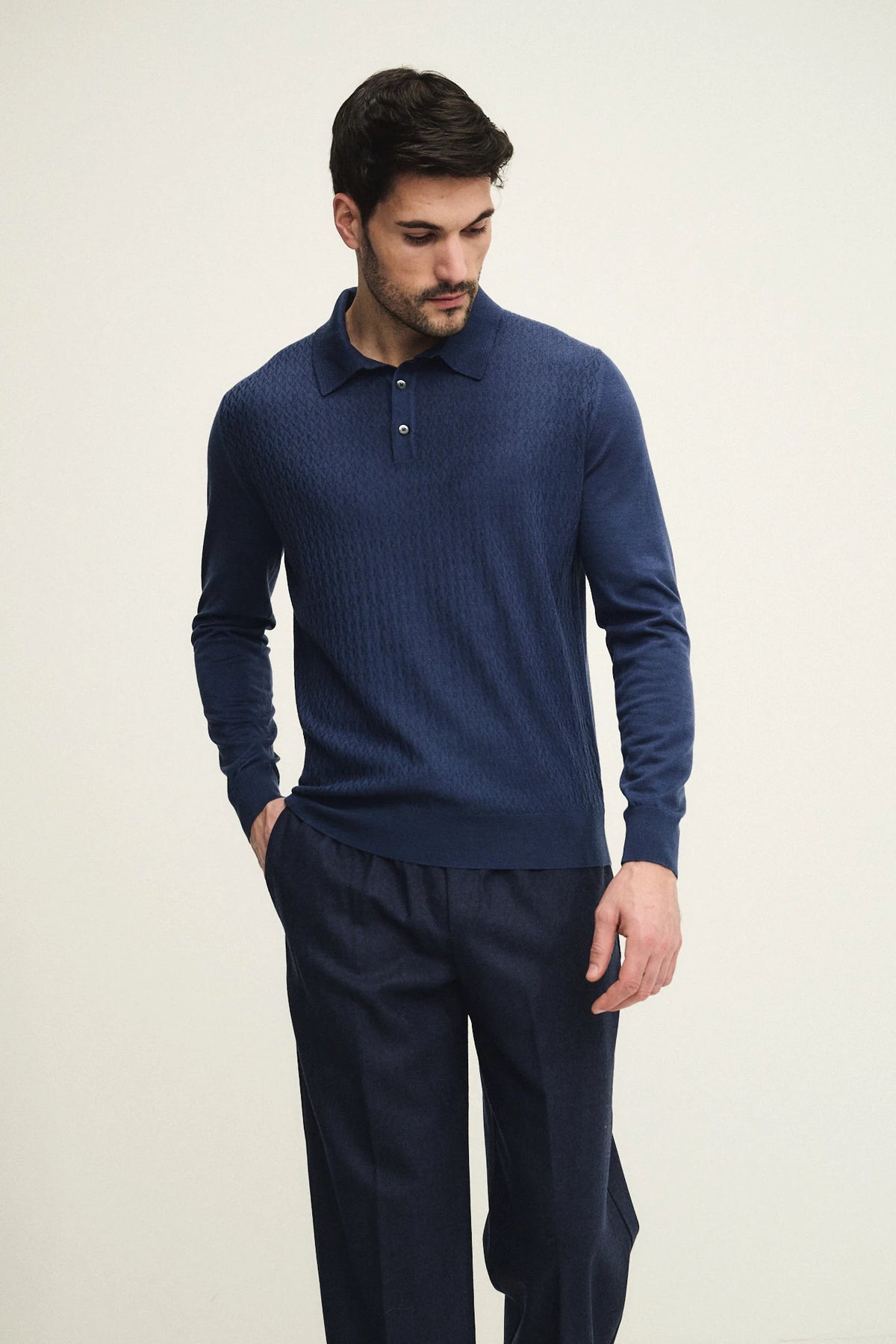 Polo zip con punto operato in lana vergine e seta