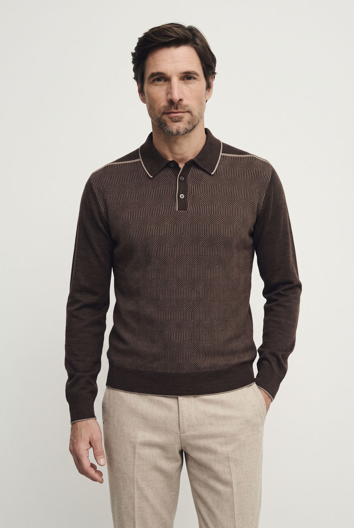 Polo bottoni con fantasia geometrica