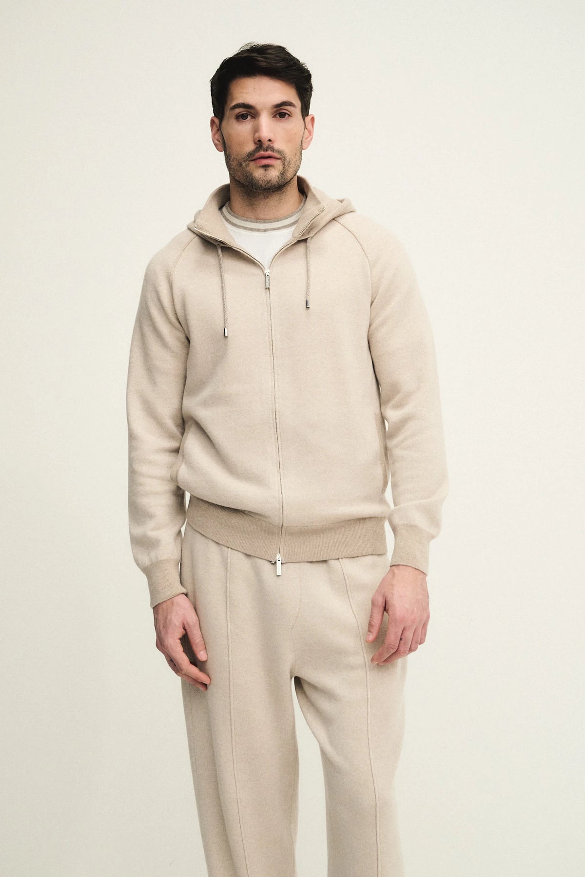 Hooded top with raglan sleeves