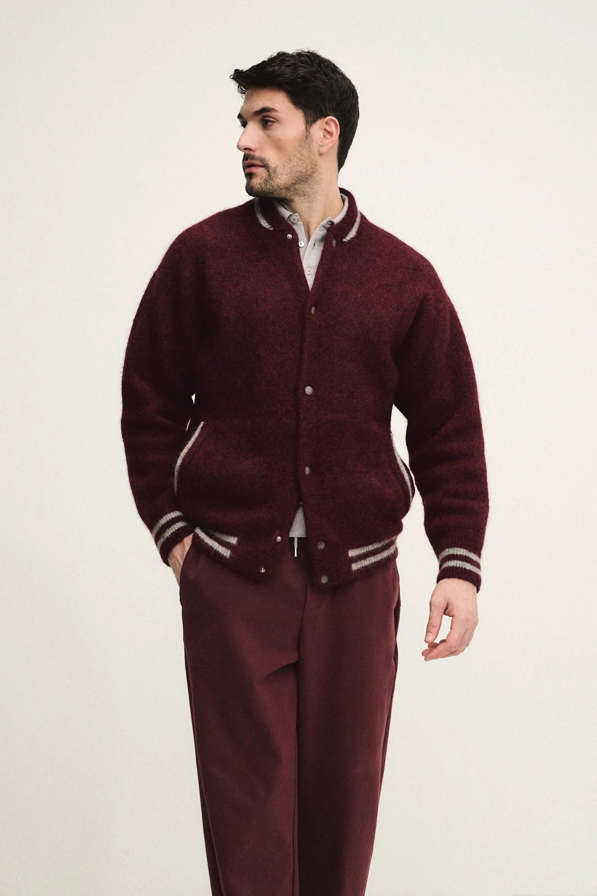 Bomber in maglia di lana alpaca elasticizzata con bottoni automatici