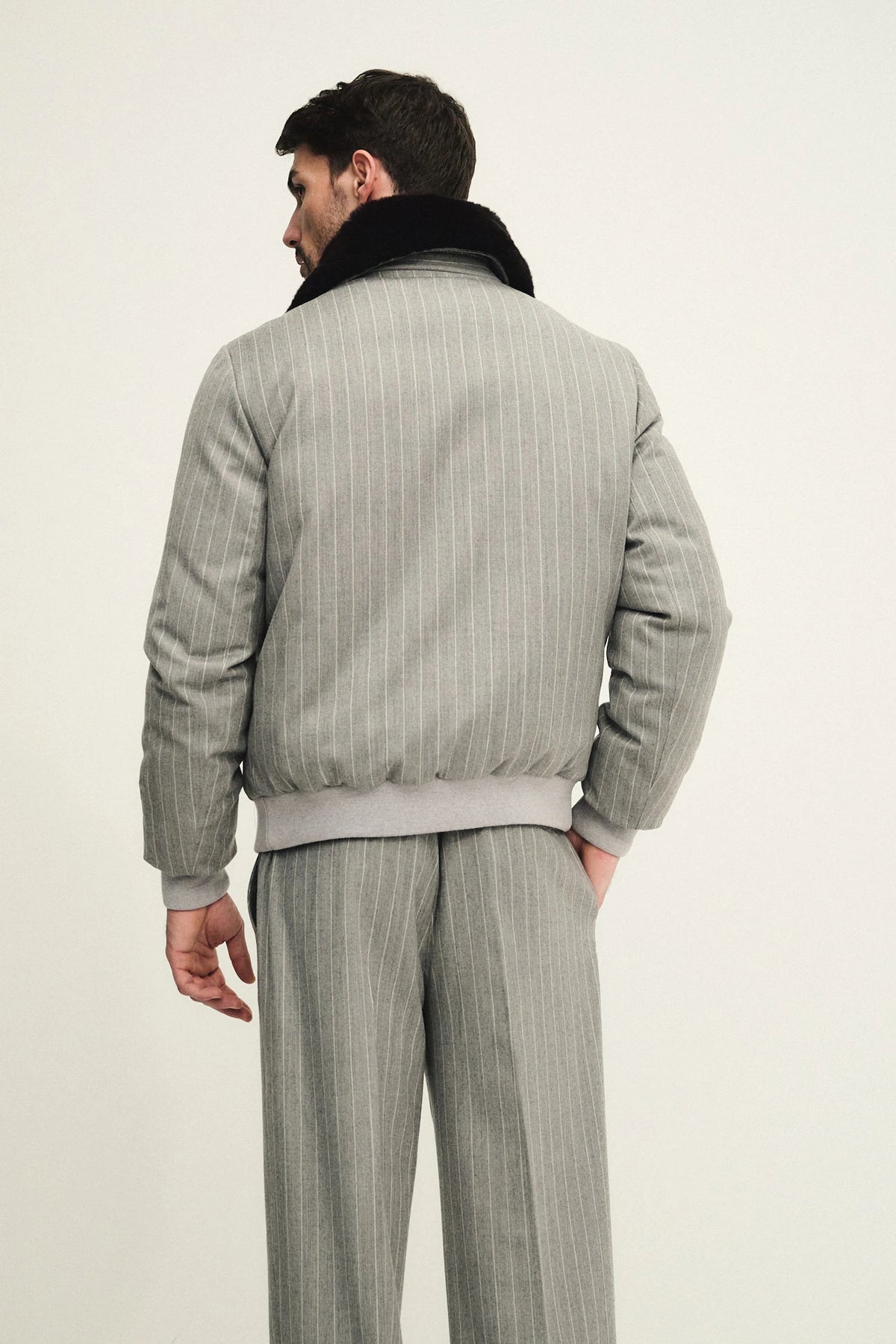 Blouson in tessuto gessato di lana e cashmere con applicazione collo in pelliccia